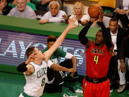 Apr 28, 2016; Boston, MA, USA; Atlanta Hawks forward Paul Millsap (4) shoots the ball against Boston Celtics forward Jonas Jerebko (8) during the first half in game six of the first round of the NBA Playoffs at TD Garden. Mandatory Credit: Mark L. Baer-USA TODAY Sports