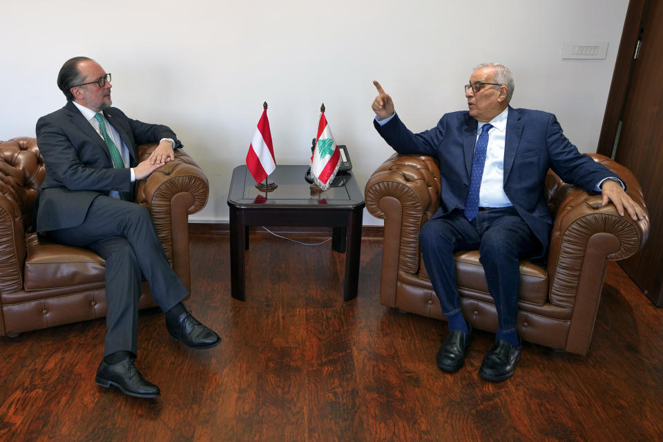 Lebanese Foreign Minister Abdallah Bouhabib, right, meets with his Austrian counterpart Alexander Schallenberg in Beirut, Lebanon, Thursday, Feb. 29, 2024. Schallenberg urged Israel and Lebanon's militant Hezbollah group not to escalate the conflict along the border saying Thursday that the Middle East has witnessed enough devastation and cruelty. (AP Photo/Bilal Hussein)