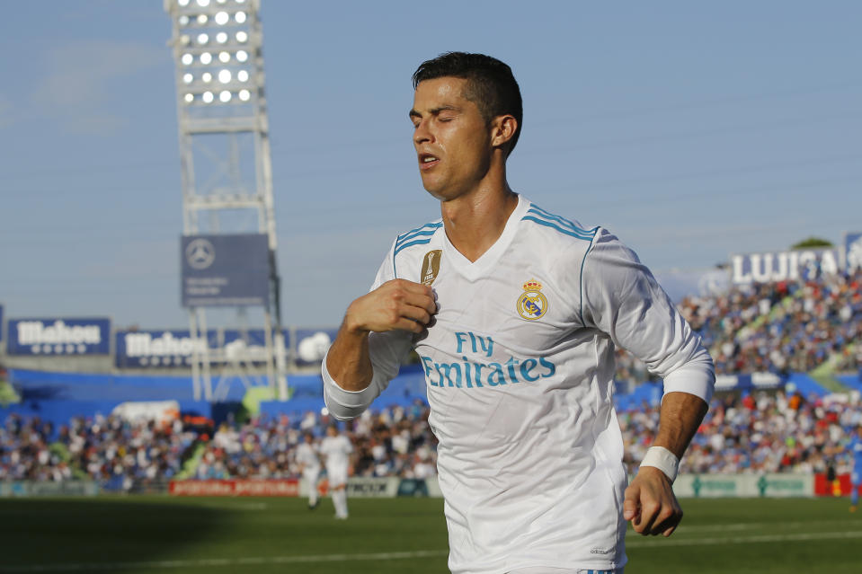 Real Madrid’s Cristiano Ronaldo celebrates after scoring the winning goal during a Spanish La Liga soccer match between Getafe and Real Madrid at the Coliseum Alfonso Perez in Getafe, Spain, Saturday, Oct. 14, 2017. (AP Photo/Paul White)