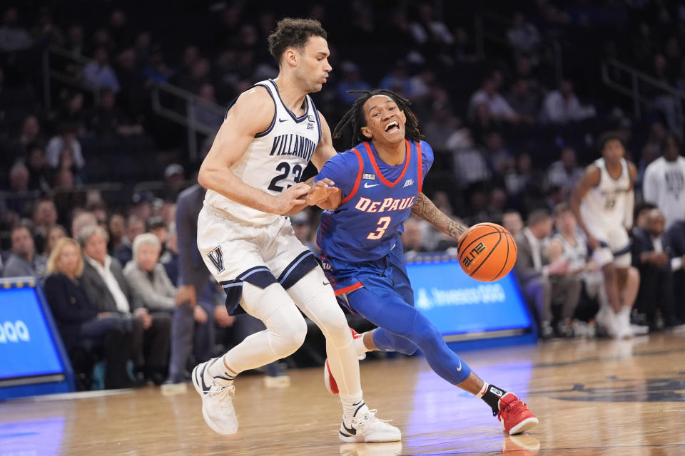 DePaul guard Jalen Terry (3) drives against Villanova forward Tyler Burton during the second half of an NCAA college basketball game in the first round of the Big East Conference tournament, Wednesday, March 13, 2024, in New York. (AP Photo/Mary Altaffer)