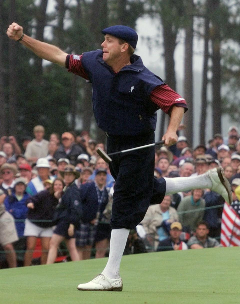 FILE - In this June 20, 1999, file photo, Payne Stewart celebrates after winning the U.S. Open golf championship at the Pinehurst No. 2 course in Pinehurst, N.C. (AP Photo/Chuck Burton, File)
