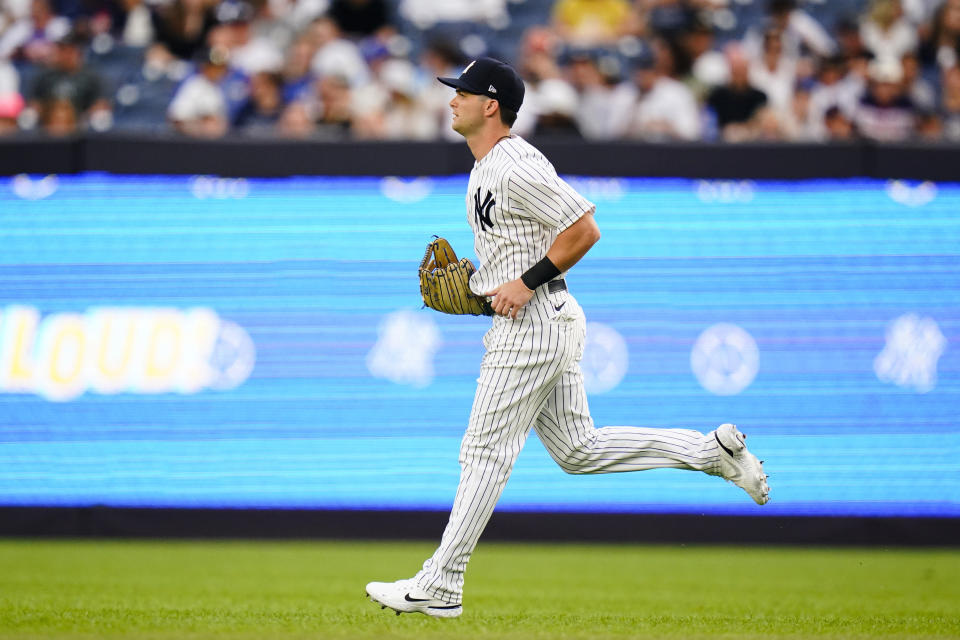 New York Yankees' Andrew Benintendi takes the field for the team's baseball game against his former team, the Kansas City Royals, Thursday, July 28, 2022, in New York. (AP Photo/Frank Franklin II)