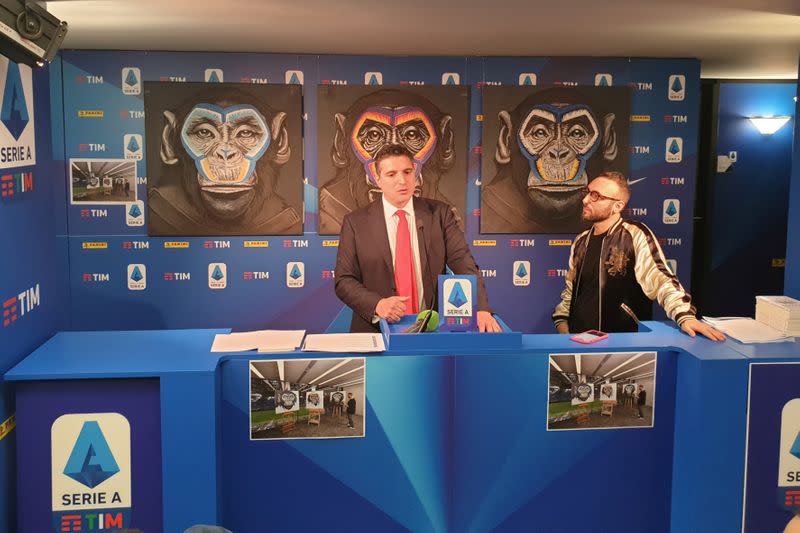 An anti-racism campaign artwork by Italian artist Simone Fugazzotto featuring three side-by-side paintings of apes is presented by Italian soccer league Serie A during a news conference in Milan