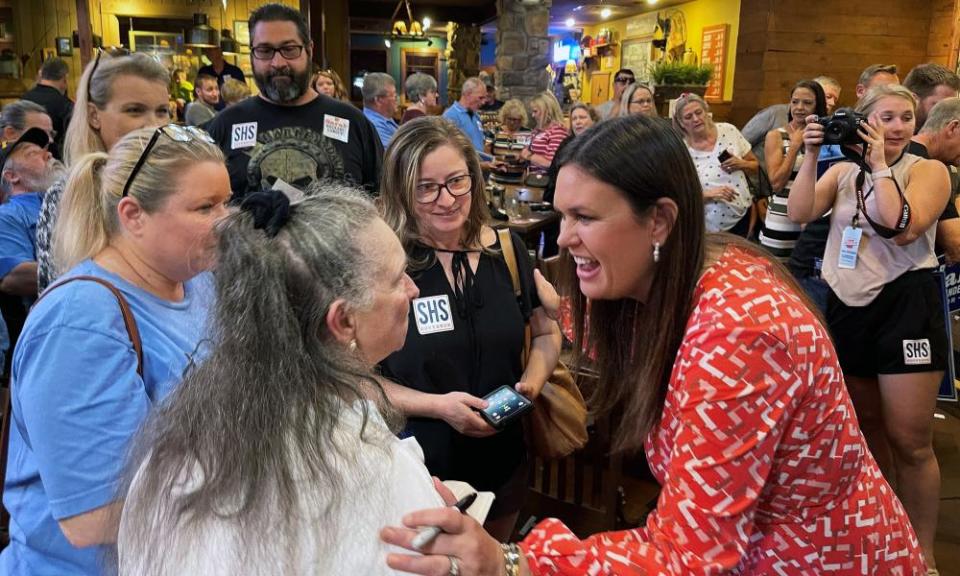 Former White House press secretary Sarah Sanders greets supporters at Colton’s Steak House in Cabot, Arkansas.