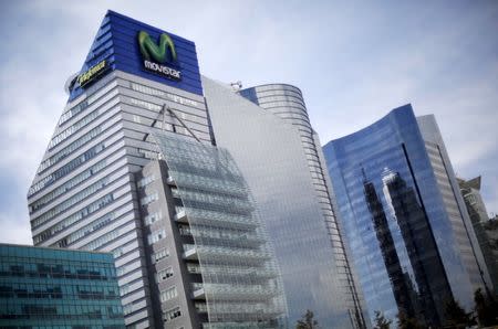 Telefonica and Movistar logos are seen on top of a Telefonica Mexico building in Mexico City, Mexico, April 15, 2016. REUTERS/Edgard Garrido