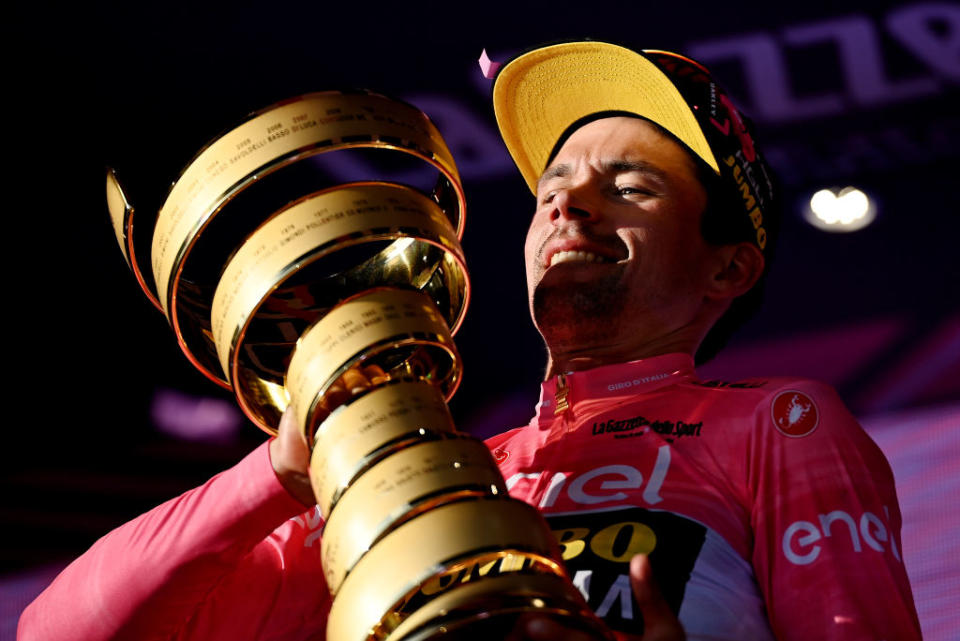 ROME ITALY  MAY 28 Primo Rogli of Slovenia and Team JumboVisma  Pink Leader Jersey celebrates at podium with the Trofeo Senza Fine as final overall race winner during the 106th Giro dItalia 2023 Stage 21 a 126km stage from Rome to Rome  UCIWT  on May 28 2023 in Rome Italy Photo by Tim de WaeleGetty Images