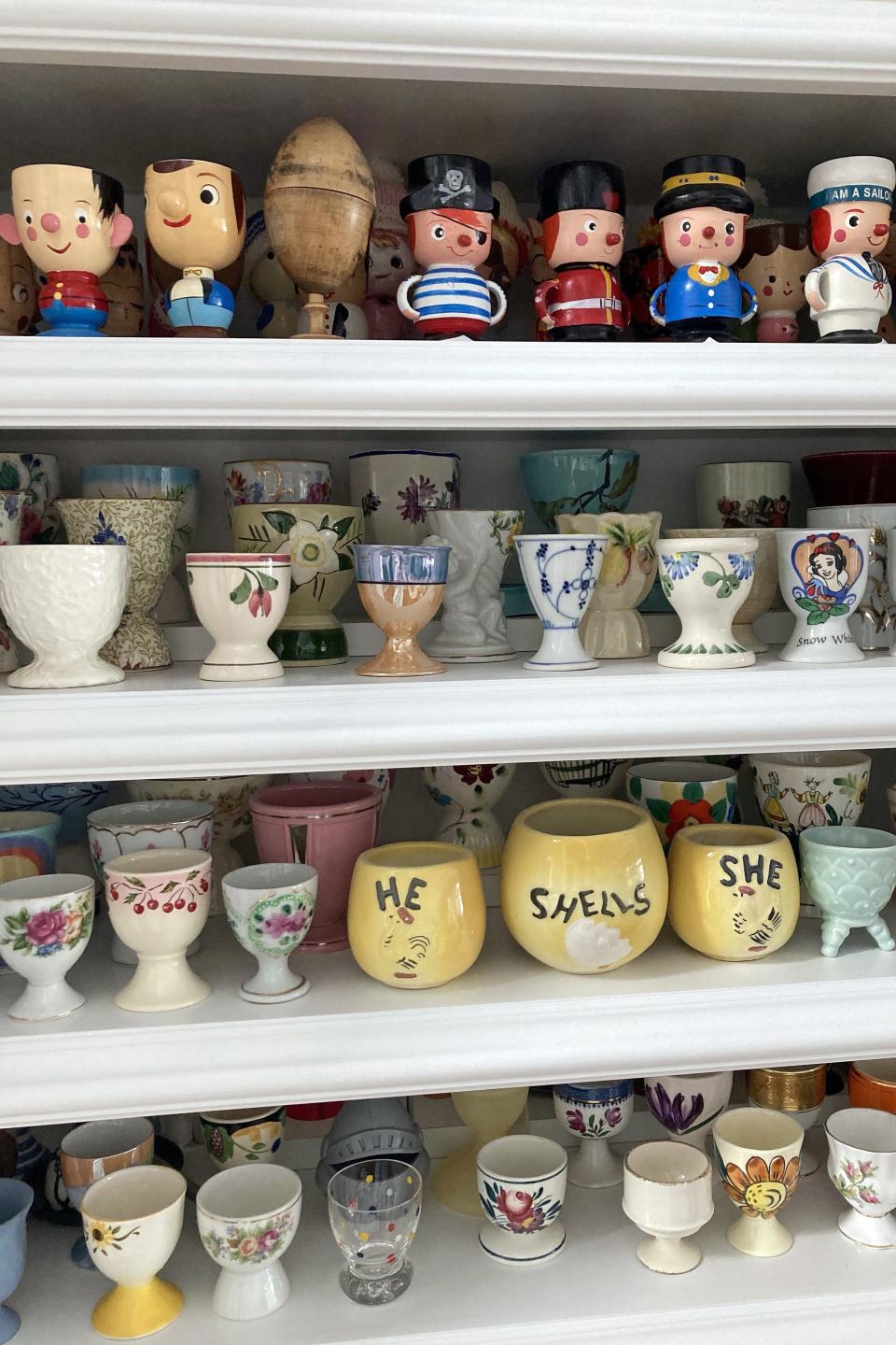 Susie Beverstein's egg cup collection fills numerous shelves in her home.