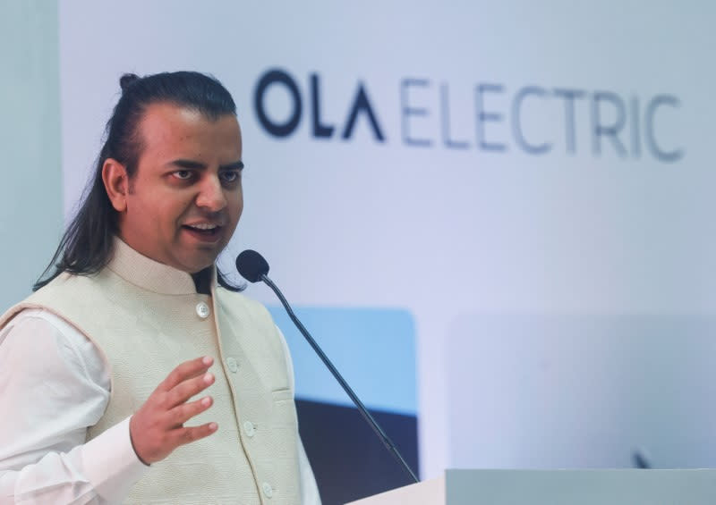 Bhavish Aggarwal, CEO of Ola Cabs and founder of Ola Electric speaks to people ahead of Ola Electric's listing ceremony at the National Stock Exchange (NSE) in Mumbai