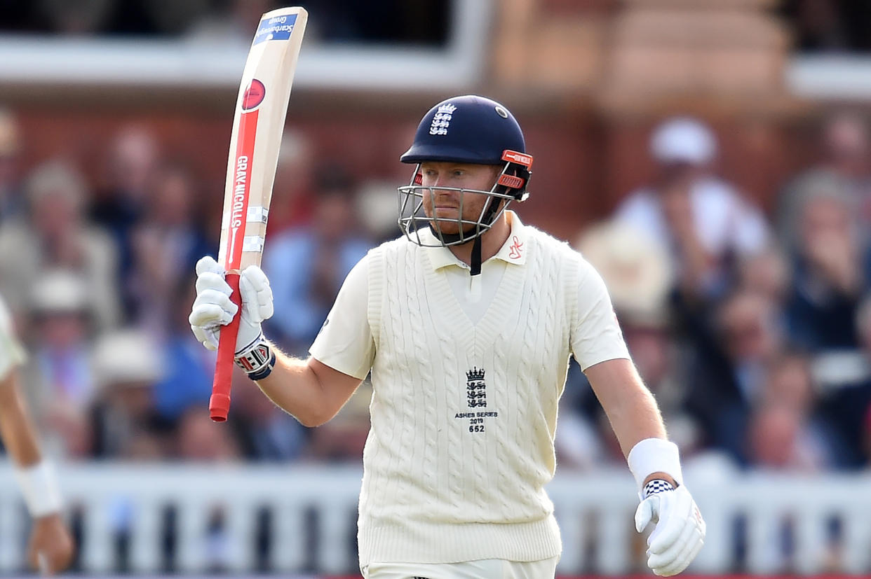 England's Jonny Bairstow celebrates his half-century on day two of the second Ashes Test. (Photo by Glyn KIRK / AFP) / RESTRICTED TO EDITORIAL USE. NO ASSOCIATION WITH DIRECT COMPETITOR OF SPONSOR, PARTNER, OR SUPPLIER OF THE ECB        (Photo credit should read GLYN KIRK/AFP/Getty Images)
