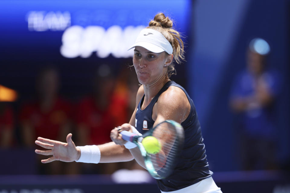 Beatriz Haddad Maia of Brazil hits a shot during her match against Sara Sorribes Tormo of Spain at the United Cup tennis tournament in Perth, Australia, Friday, Dec. 29, 2023. (AP Photo/Trevor Collens)