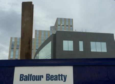 A sign of Balfour Beatty is seen at a construction site in London, Britain October 30, 2015. REUTERS/Reinhard Krause/Files