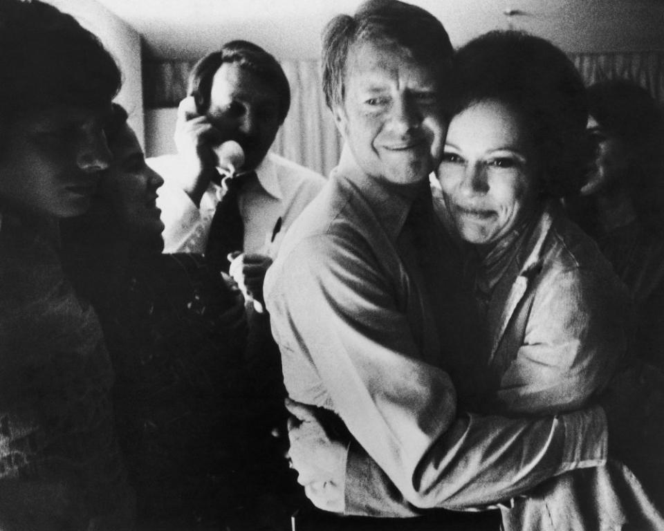 Jimmy Carter embraces Rosalynn after receiving the final news of his victory in the national general election, on Nov. 2, 1976.<span class="copyright">Hulton Archive/Getty Images</span>