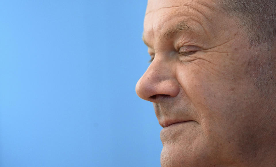 German Chancellor Olaf Scholz attends his first annual summer news conference in Berlin, Germany, Thursday, Aug. 11, 2022. (AP Photo/Michael Sohn)