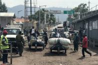 FILE PHOTO: COVID-19 pandemic derails trade for Congo's disabled border couriers in Goma