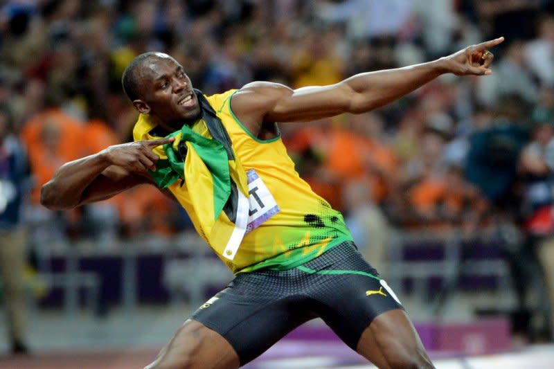 Jamaica's Usain Bolt celebrates with his traditional arrow jubilation after winning the gold medal in the Men's 200M final at Olympic Stadium during the London 2012 Summer Olympics in Stratford, London on August 9, 2012. Bolt became the first Olympian to win the 100M and 200M race in consecutive Olympics. File Photo by Pat Benic/UPI