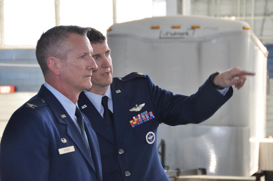 U.S. Air Force Col. Derek Price, commander of the 58th Operations Group, left, and Lt. Col. Derek Cumbie, speak before the 58th OG Detachment 3 activation ceremony Jan. 31, 2024, at Maxwell Air Force Base, Alabama. Det. 3 is the active associate unit to the 908th Airlift Wing for their new mission as the formal training unit for the MH-139A Grey Wolf helicopter.