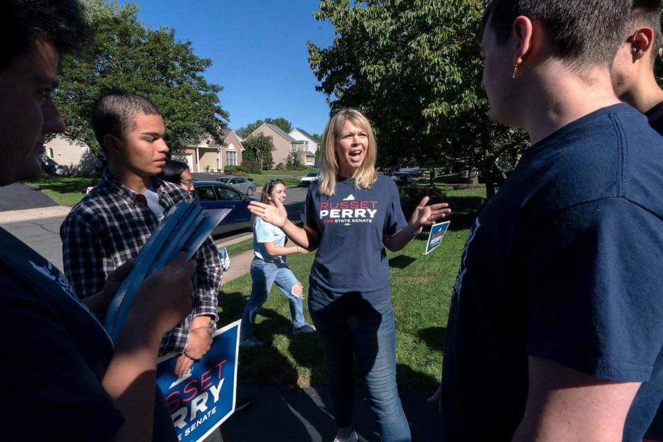 PHOTO: In this Sept. 16, 2023, file photo, Virginia state Senate candidate Russet Perry, joins campaign volunteers during a campaign stop in the Cascades area of Sterling, Va. (Manuel Balce Ceneta/AP, FILE)