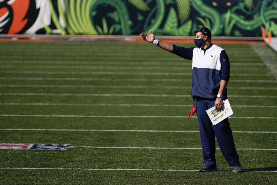 Tennessee Titans head coach Mike Vrabel questions a call during the first half of an NFL football game against the Cincinnati Bengals, Sunday, Nov. 1, 2020, in Cincinnati. (AP Photo/Bryan Woolston)