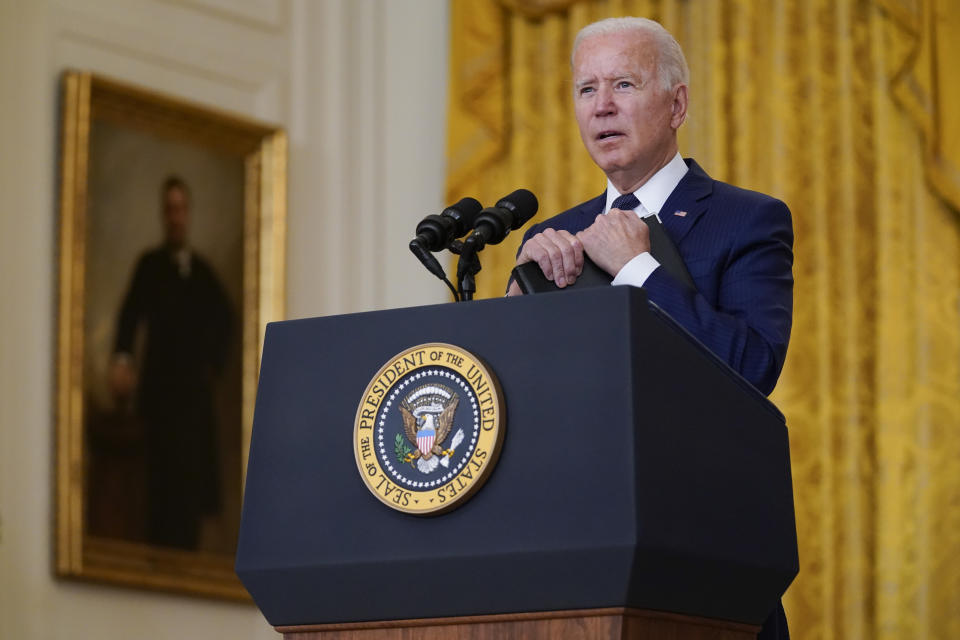 In this Aug. 26, 2021, photo, President Joe Biden answers questions from members of the media about the bombings at the Kabul airport that killed at least 12 U.S. service members, from the East Room of the White House in Washington. As the U.S. rushes to evacuate Americans and allies from Afghanistan, a growing number of Republicans are questioning why the U.S. should take in Afghan citizens who worked side by side with Americans. (AP Photo/Evan Vucci)