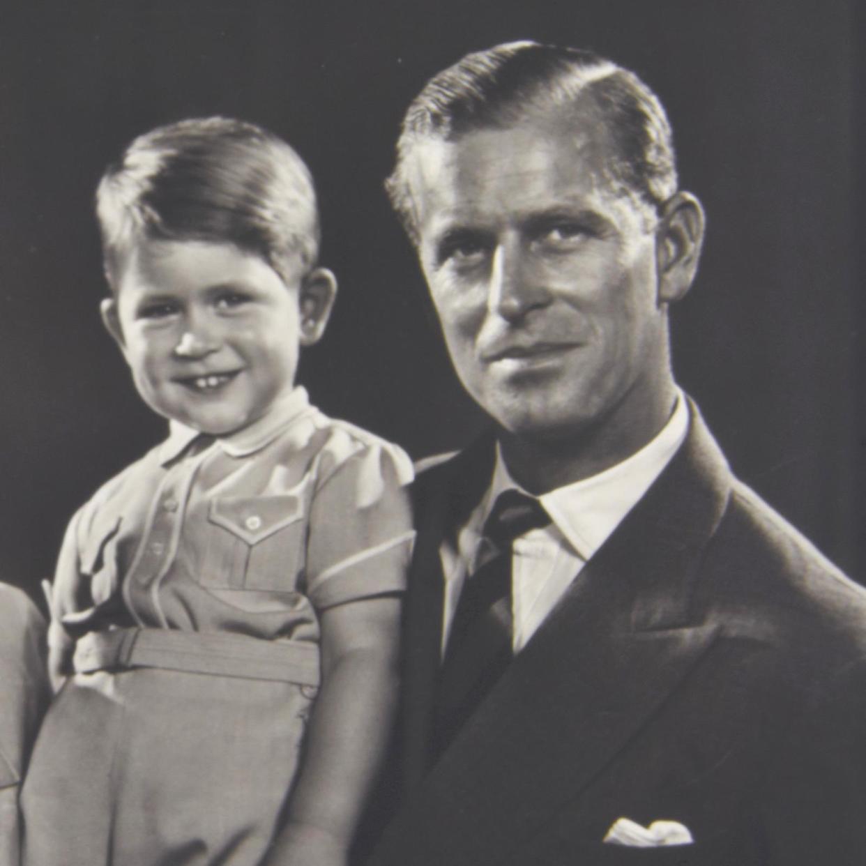 Prince Philip with a young Prince Charles.