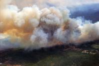 A Canadian Joint Operations Command aerial photo shows wildfires in Fort McMurray, Alberta, Canada in this image posted on twitter May 5, 2016. Courtesy CF Operations/Handout via REUTERS ATTENTION EDITORS - THIS IMAGE WAS PROVIDED BY A THIRD PARTY. EDITORIAL USE ONLY. NO RESALES. NO ARCHIVE