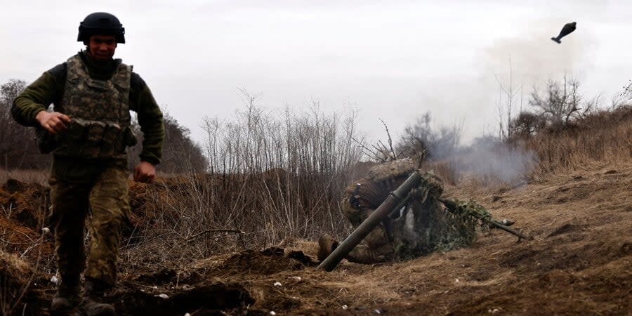 Servicemen of the Armed Forces of Ukraine conduct mortar fire near Bakhmut