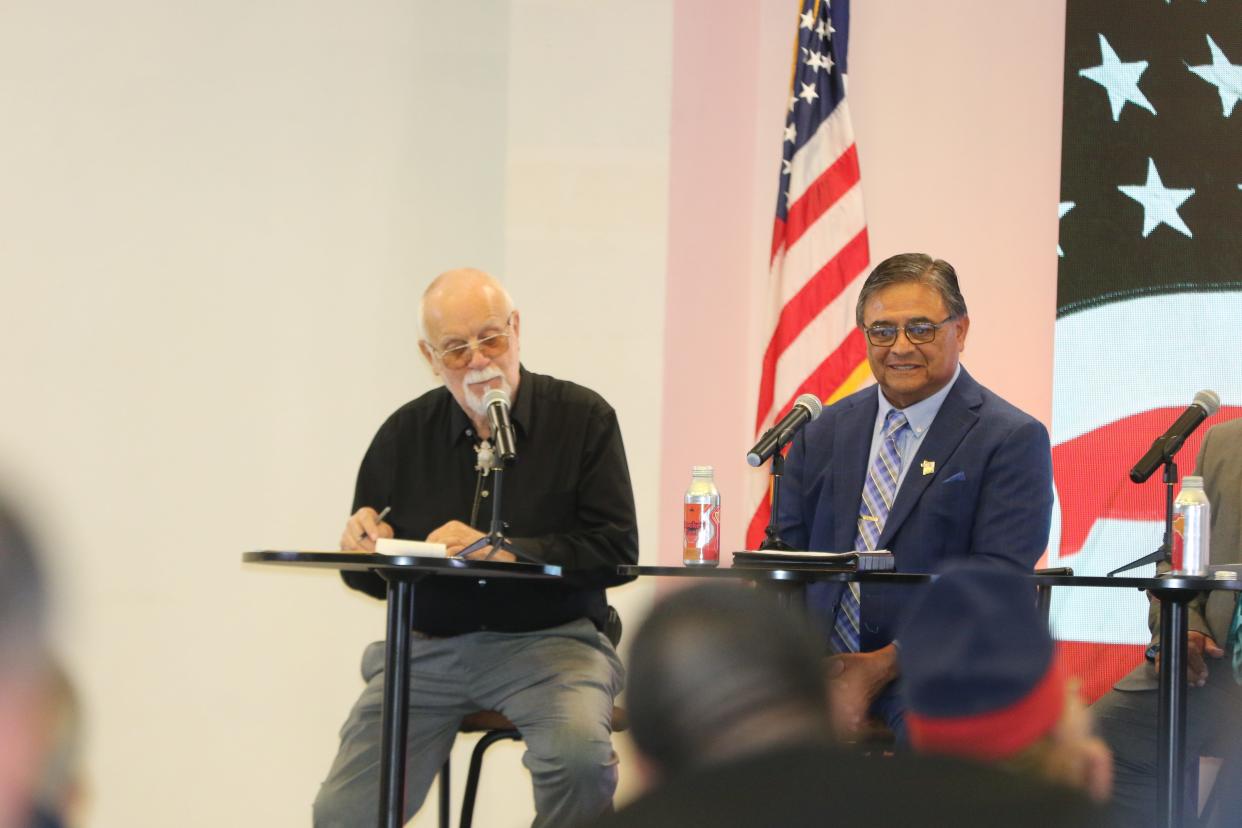 Carlsbad mayoral candidates Norbert Rempe (left) and Edward Rodriguez pause during a candidate forum on Oct. 30, 2023, at the Pecos River Village Conference Center.