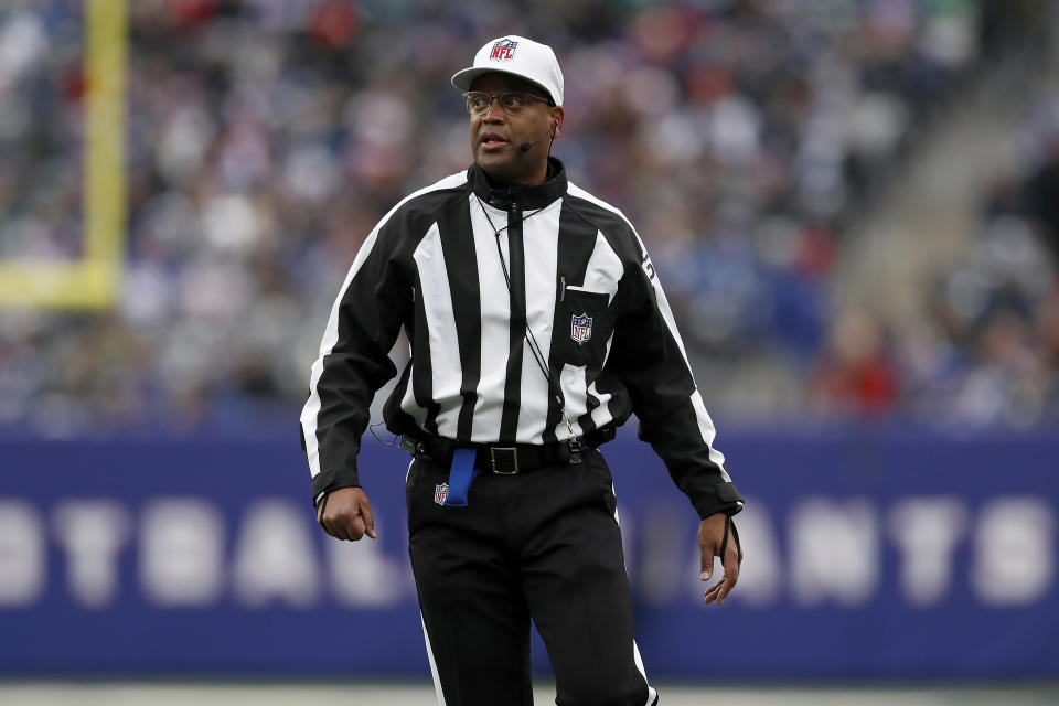 Referee Ron Torbert (62) works during an NFL football game between the New York Giants and the Philadelphia Eagles, Sunday, Nov. 28, 2021, in East Rutherford, N.J. The New York Giants defeated the Philadelphia Eagles 13-7. (AP Photo/Steve Luciano)