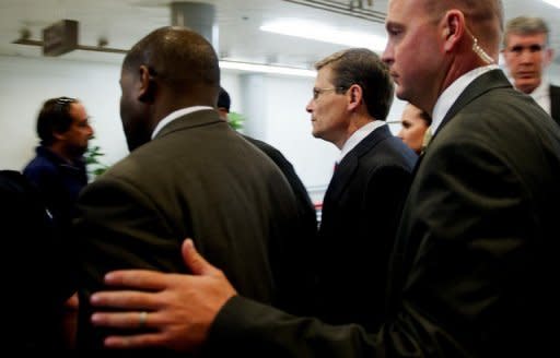 Acting Director of the Central Intelligence Agency (CIA) Michael Morell (C) is escorted by security as he leaves a meeting on Capitol Hill in Washington, November 13. Morell was named acting director following David Petraeus' resignation after acknowledging an extramarital affair