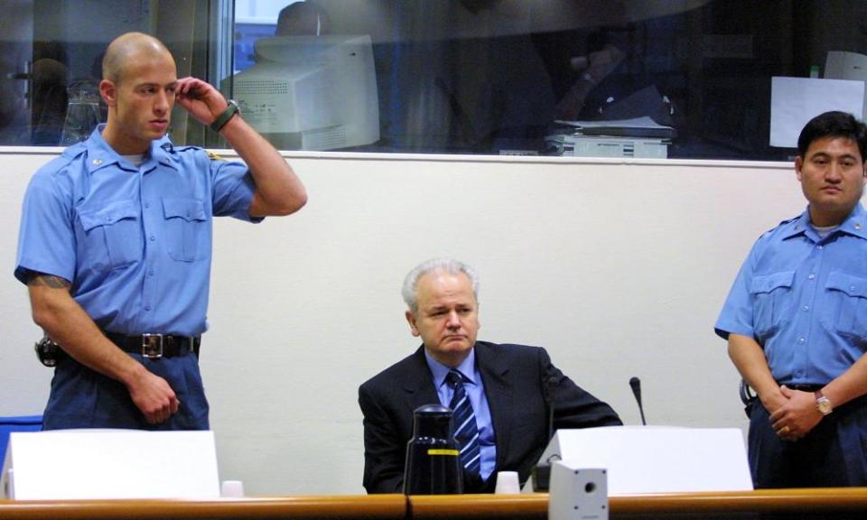 Slobodan Milosevic in a courtroom of the war crimes tribunal in The Hague, January 2002.