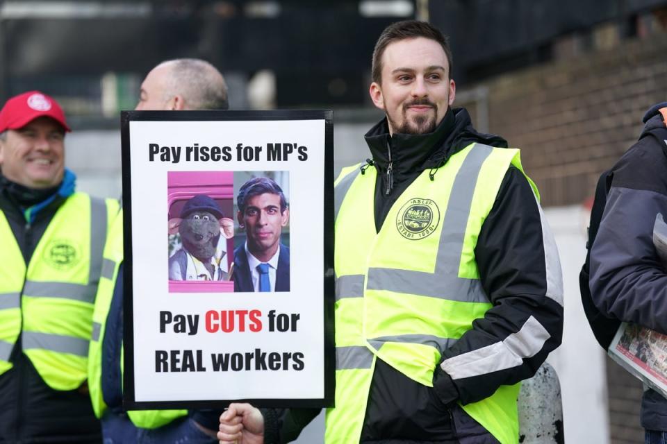 Members of the Aslef union on the picket line outside London Euston rail station as rail workers take strike action in a dispute over pay (PA)