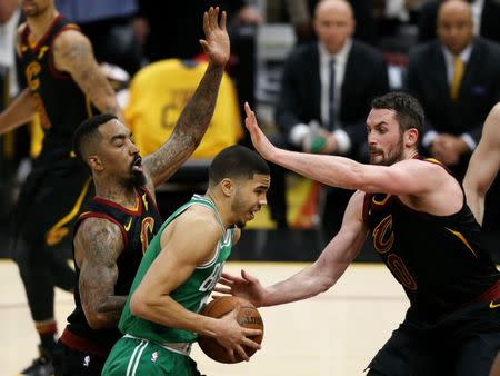 May 19, 2018; Cleveland, OH, USA; Cleveland Cavaliers center Kevin Love (0) defends Boston Celtics forward Jayson Tatum (0) during the third quarter in game three of the Eastern conference finals of the 2018 NBA Playoffs at Quicken Loans Arena. Mandatory Credit: Aaron Doster-USA TODAY Sports