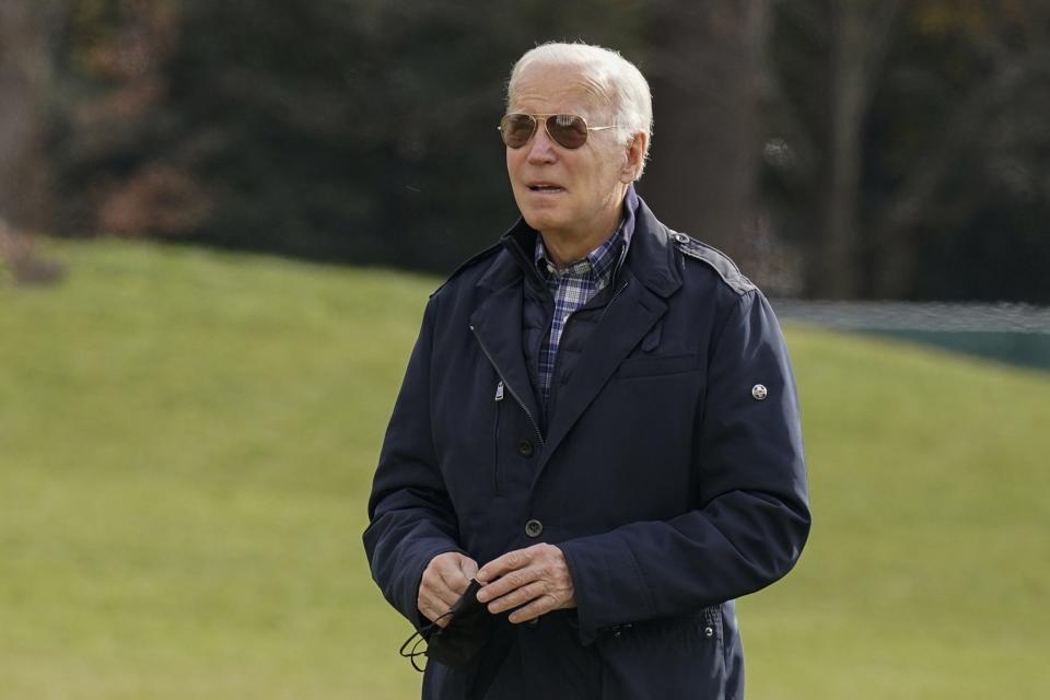 President Joe Biden walks to the White House as he arrives on Marine One, Sunday, Dec. 5, in Washington. [AP PHOTO/CAROLYN KASTER]