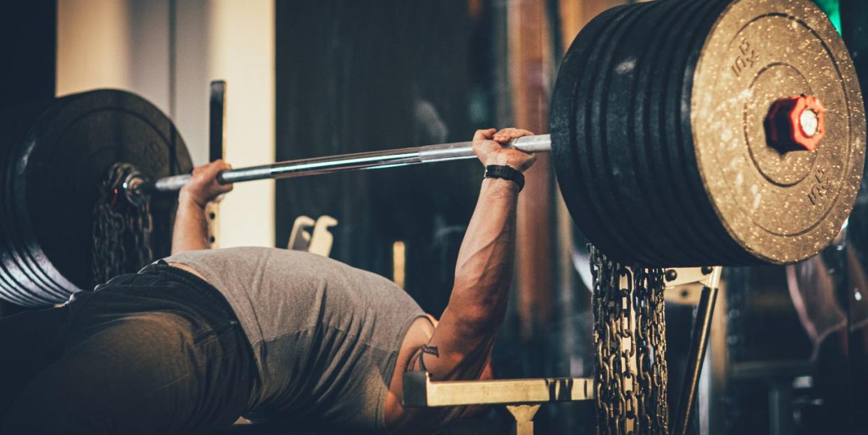 man weightlifter at the gym