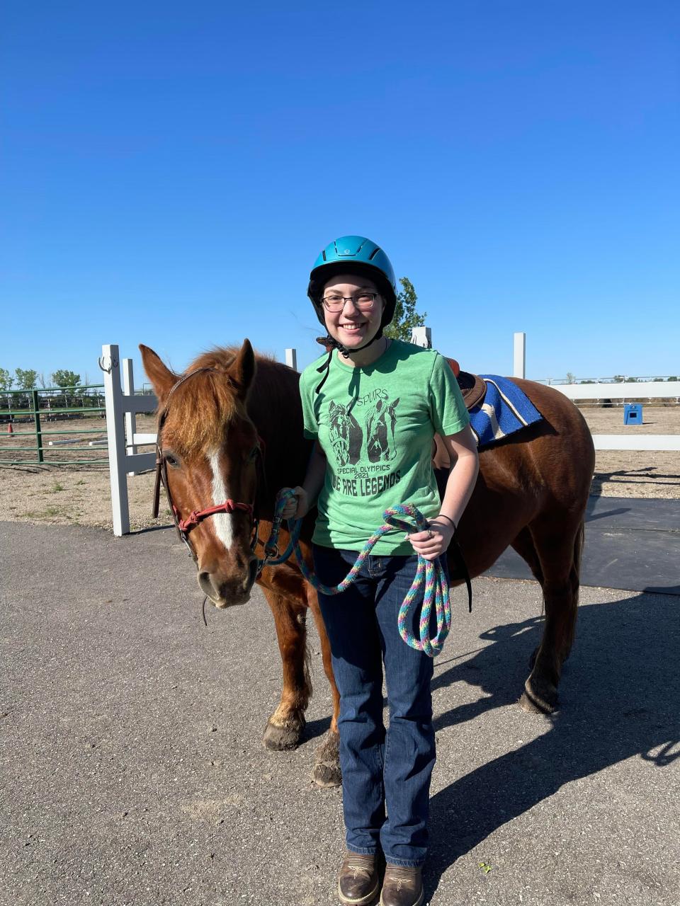 Eschenbaum poses with her horse during a training session at SPURS Therapeutic Riding Center. Eschenbaum is headed to the 2022 Special Olympics USA Games.