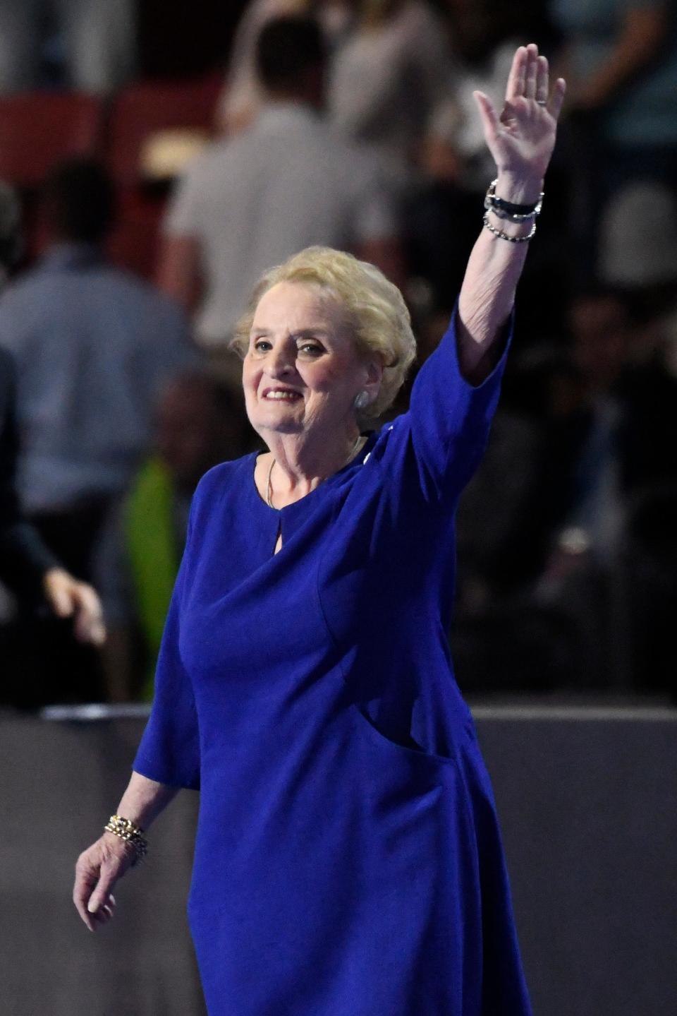 Former U.S. Secretary of State Madeleine Albright reacts to the convention goers as she makes her way on the stage during the 2016 Democratic National Convention at Wells Fargo Arena on July 26, 2016.