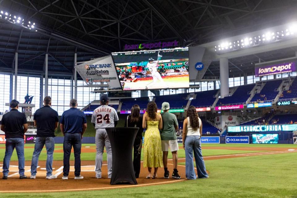 Detroit Tigers designated hitter and former Miami Marlins player Miguel Cabrera (24) watches highlights from his days as a Florida Marlin alongside his family and former teammates during a pregame ceremony celebrating Cabrera’s career before an MLB game at loanDepot park in the Little Havana neighborhood of Miami, Florida, on Friday, July 28, 2023.