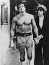 <p>Matched up against 6'5" Dolph Lundgren (Drago) and 6'2" Carl Weathers (Creed) doesn't make you look any taller. Chuck Wepner, the real-life boxer upon which Rocky is loosely based, was 6'5". </p>