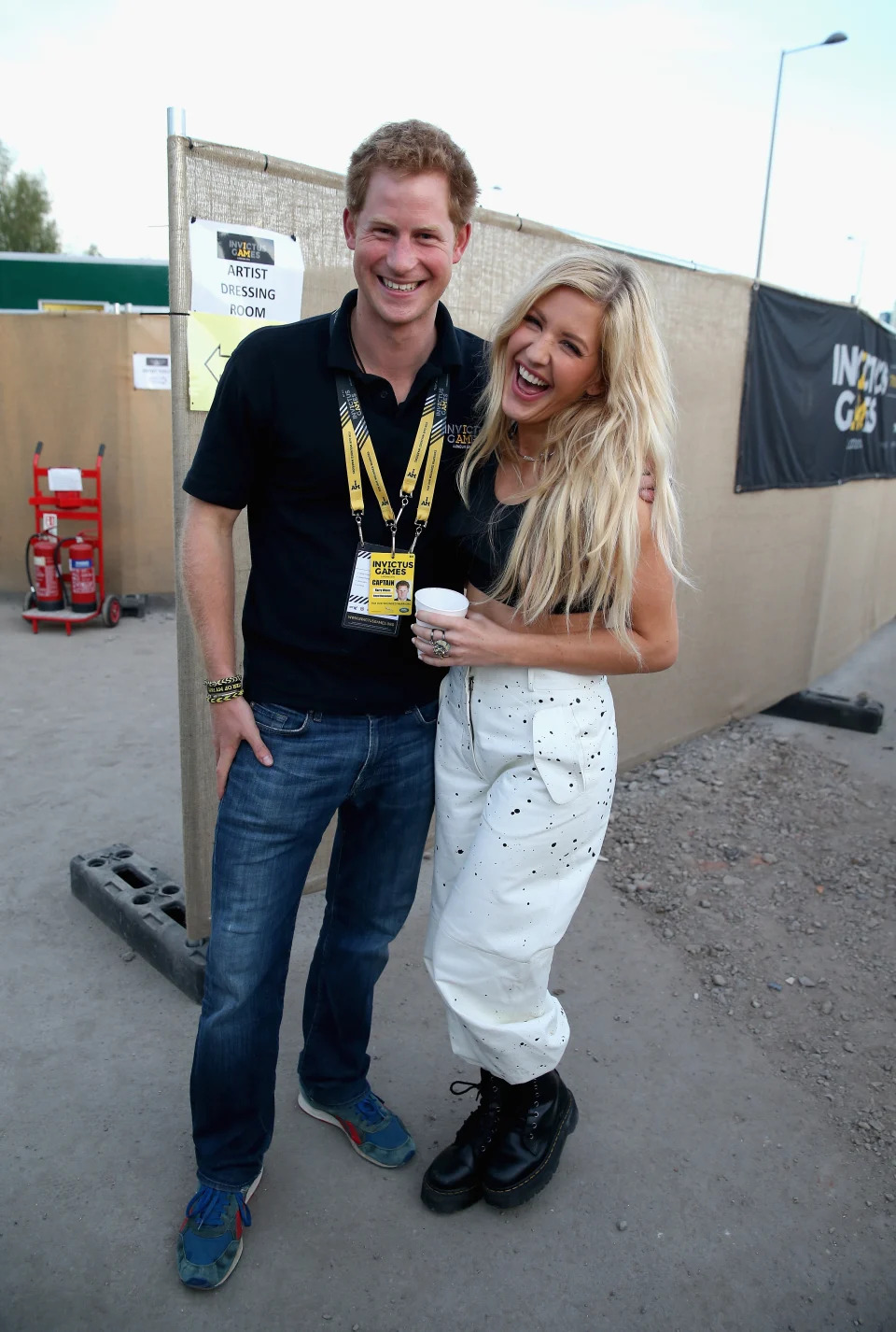 LONDON, ENGLAND - SEPTEMBER 14:  Prince Harry with Ellie Goulding backstage at the Invictus Games Closing Ceremony during the Invictus Games at Queen Elizabeth park on September 14, 2014 in London, England. The International sports event for 'wounded warriors', presented by Jaguar Land Rover was an idea developed by Prince Harry after he visited the Warrior Games in Colorado USA. The four day event has brought together thirteen teams from around the world to compete in nine events such as wheelchair basketball and sitting volleyball.  (Photo by Chris Jackson/Getty Images)