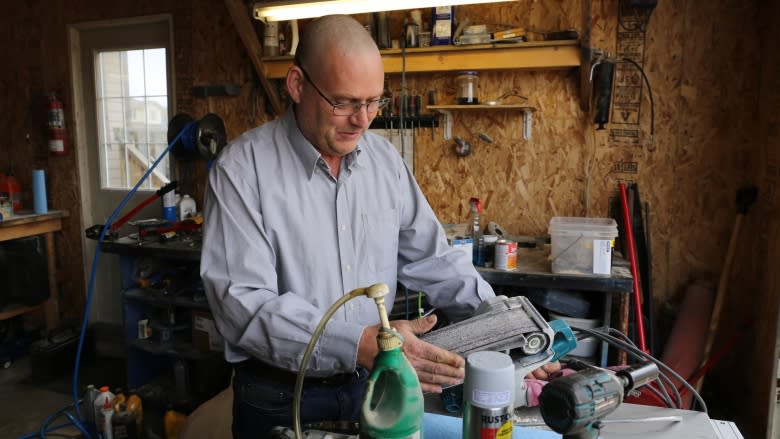 Scavenged from the ashes: Fort McMurray carpenter creates wildfire-charred furniture