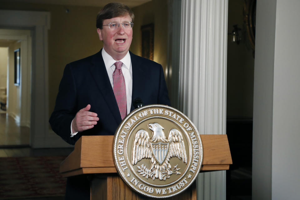 Mississippi Gov. Tate Reeves delivers a televised address prior to signing a bill retiring the last state flag in the United States with the Confederate battle emblem, during a ceremony at the Governor's Mansion in Jackson, Miss., Tuesday, June 30, 2020. The legislation passed both chambers of the Legislature on Sunday. (AP Photo/Rogelio V. Solis, Pool)