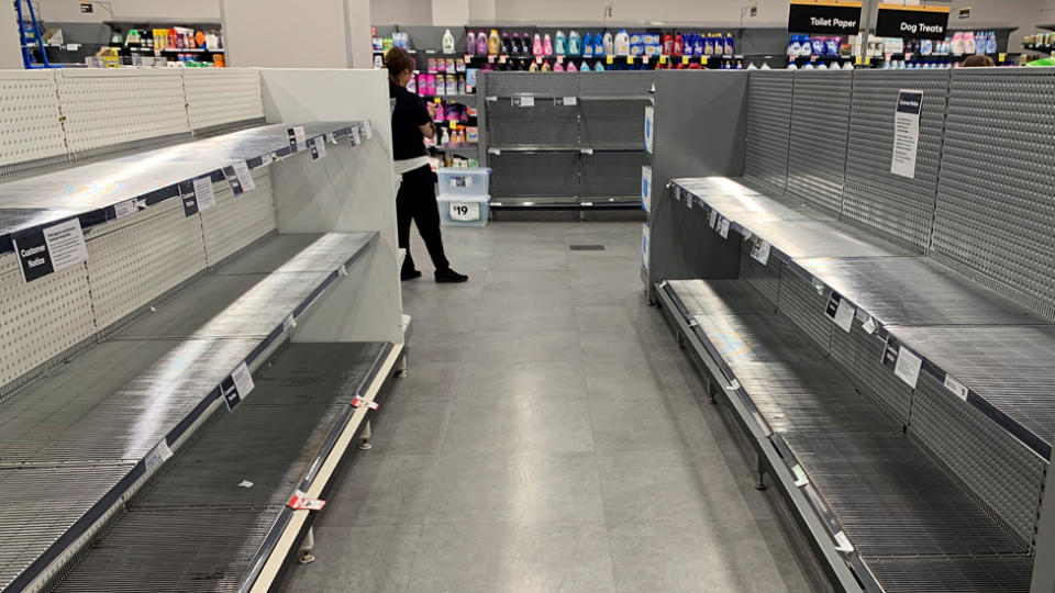Empty Woolworths shelves