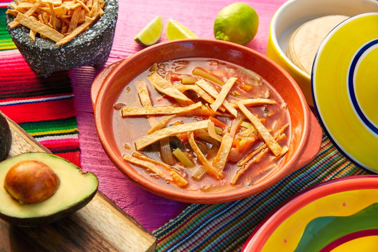 Mexican tortilla soup and aguacate colorful mexico food