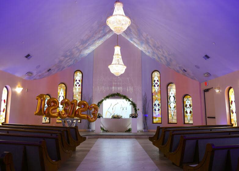 Decorations adorn The Wedding Chapel at Vegas Weddings on Tuesday, Dec. 19, 2023, in Las Vegas. The Las Vegas Review-Journal reports that New Year's Eve could take the cake for the busiest wedding day in Las Vegas thanks to the date's repeating pattern of 1-2-3-1-2-3. That's known as a specialty date for those who work in the massive Las Vegas wedding industry. (Bizuayehu Tesfaye/Las Vegas Review-Journal via AP)