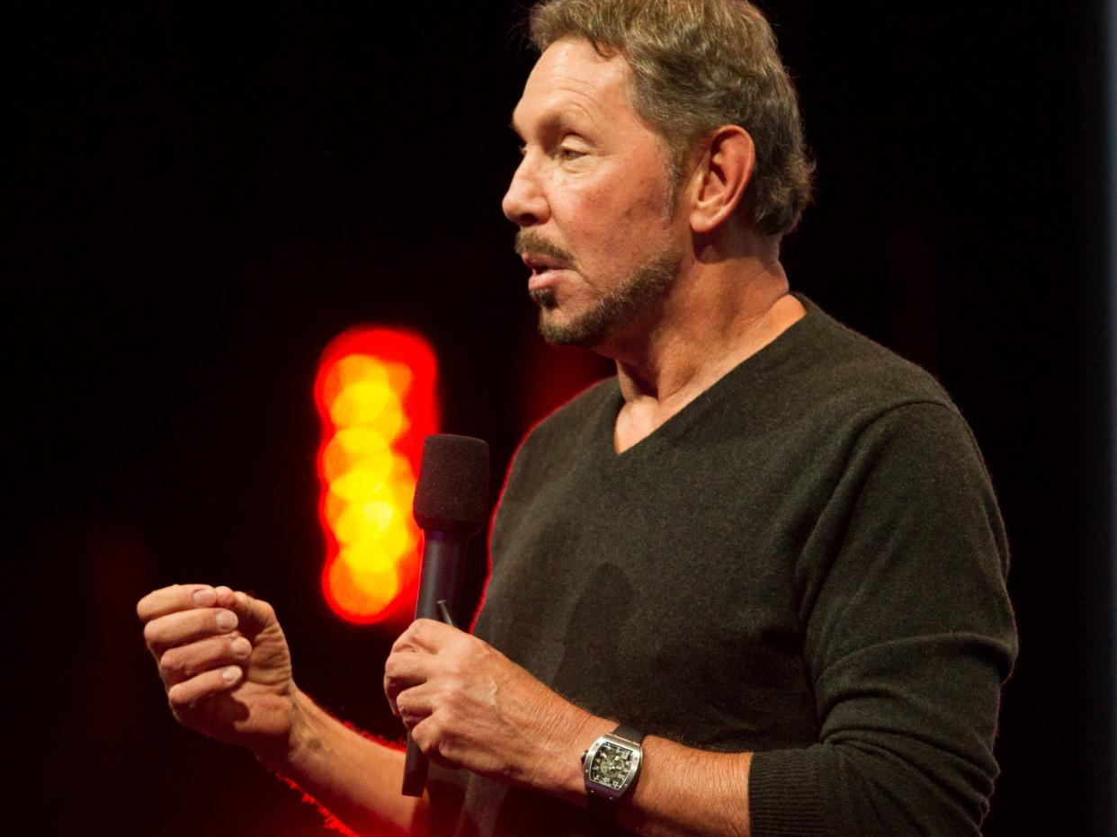 Larry Ellison talking into microphone