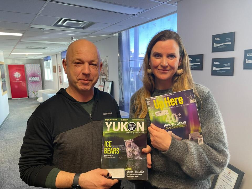 Greg Karais is the owner of North of Ordinary Media, and Manu Keggenhoff is creative director and co-publisher. The Whitehorse-based company has just acquired 2 more northern magazines, the N.W.T.-based Up Here, and Up Here Business. (Dave White/CBC - image credit)