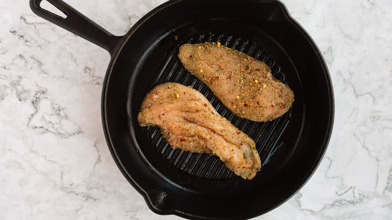 Chicken breasts in pan