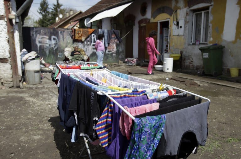 Laundry is laid out to try in front of a poor family's home in Miskolc, Hungary on April 22, 2012. Nationally, unemployment runs at around 11%, but in the northeast it is over 30%, and reaches 80 or even 100% in the most remote villages