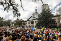 Protestors rally outside the Capitol urging Florida lawmakers to reform gun laws, in the wake of last week's mass shooting at Marjory Stoneman Douglas High School, in Tallahassee, Florida, U.S., February 21, 2018. REUTERS/Colin Hackley