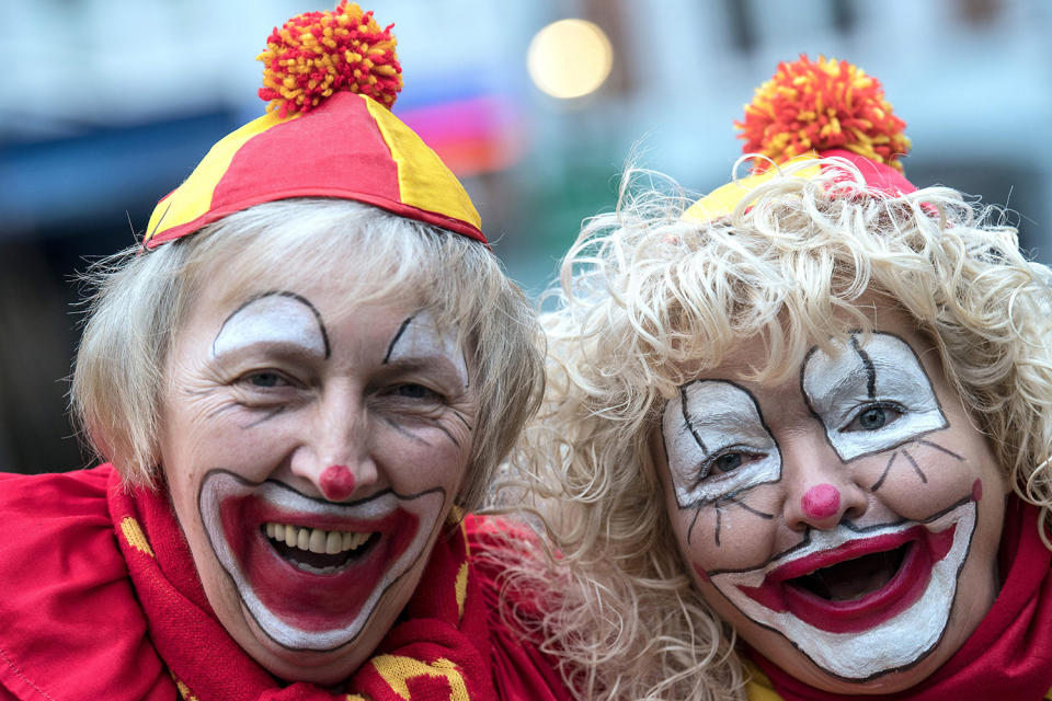 <p>Carnival revellers pose as they celebrate the start of their hot season on Women’s Carnival, Feb. 23, 2017, in Duesseldorf, western Germany. (Photo: Federico Gambarini/AFP/Getty Images) </p>